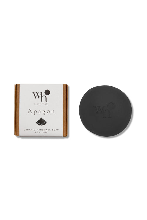 Black round activated charcoal handmade soap bar by Washo House, made in NYC for oily and acne-prone skin